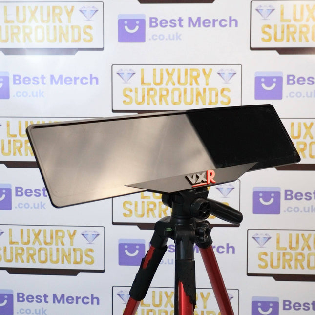 Black & Red Vauxhall VXR Plate Holder mounted on a tripod, showcasing its sleek luxury design for vehicle license plates.