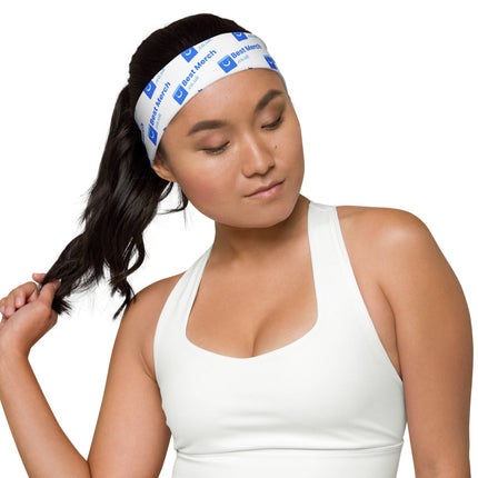 Woman adjusting her ponytail while wearing Headband - Best Merch branded, perfect for gym, yoga, and casual athleisure outfits.