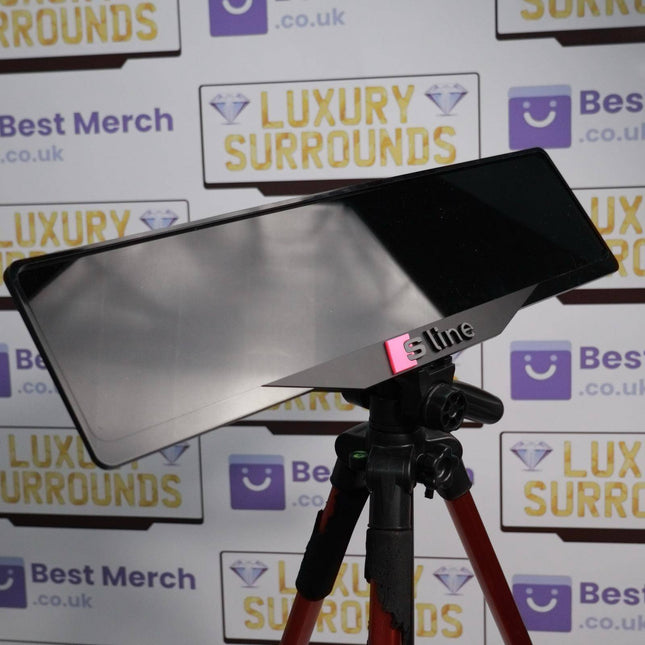 Pink Audi S-LINE Plate Holder mounted on a tripod, showcasing its sleek black frame with pink S-LINE branding for luxury vehicle decor.