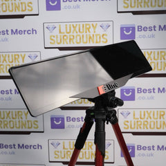 Red Audi S-LINE Plate Holder - Luxury Number Plate Holder mounted on a tripod, ideal for enhancing vehicle decor with a sleek, premium design.