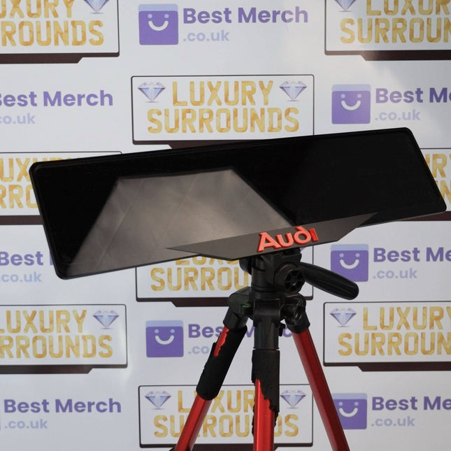 Red Audi Plate Holder - Luxury Number Plate Holder mounted on a tripod, ideal for stylish vehicle license plate display and decor upgrades.