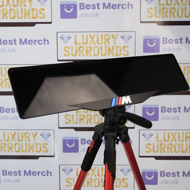 White BMW M SPORT Plate Holder with luxury finish, mounted on a tripod, ideal for enhancing vehicle decor and license plate display.