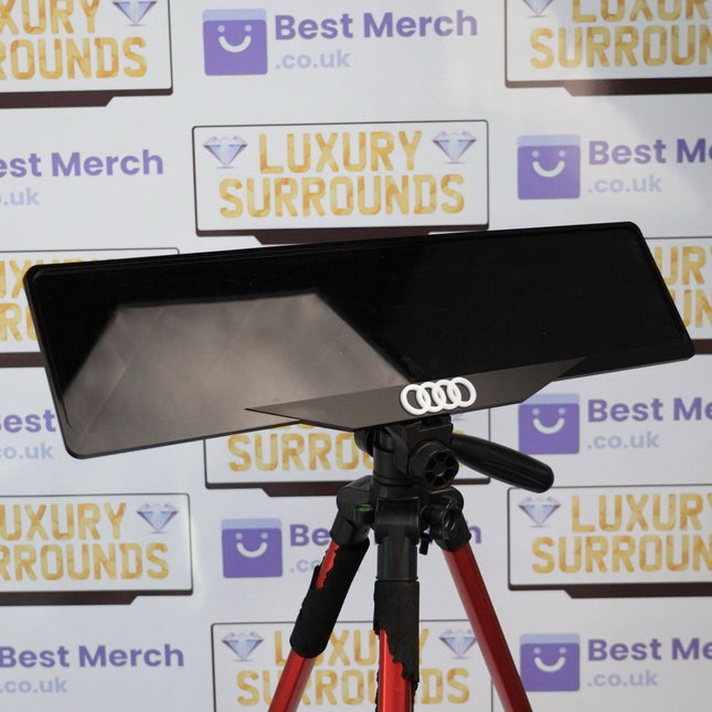 White Audi Rings Plate Holder - Luxury Number Plate Holder mounted on a tripod, ideal for enhancing vehicle decor with a sleek, premium look.