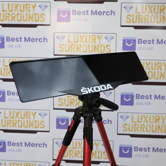 White Skoda Badge Plate Holder - Luxury Number Plate Holder mounted on a tripod, ideal for enhancing vehicle decor with a sleek, premium finish.