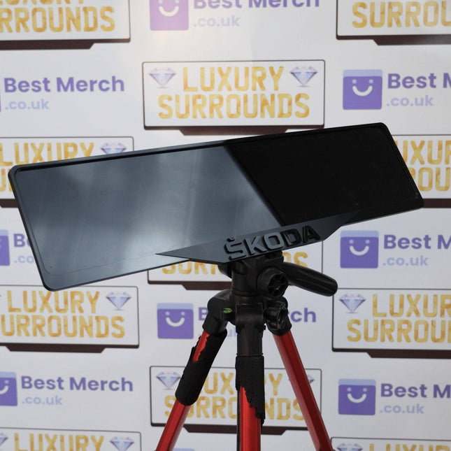 Black Skoda Badge Plate Holder - Luxury Number Plate Holder mounted on a tripod, showcasing sleek black finish and premium Skoda branding.