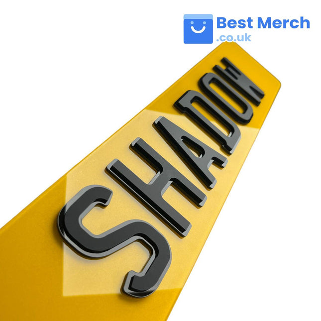 Shadow Number Plates - Premium 4D Plates featuring bold black raised lettering on a glossy yellow background, angled for a dynamic view.